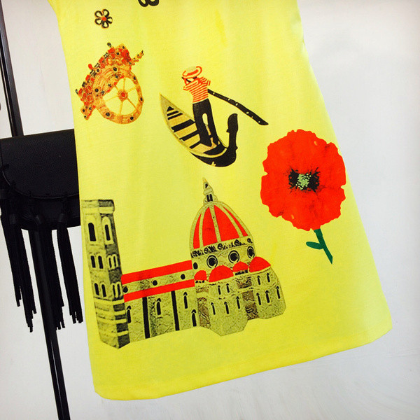 Γυναικείο  φόρεμα σε κίτρινο χρώμα με επιγραφές