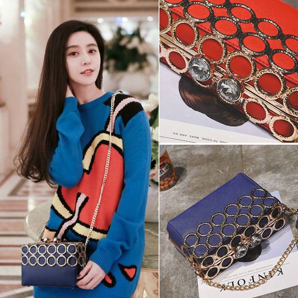 Geanta de dama eleganta in patru culori cu decor metalic cu maner metalic