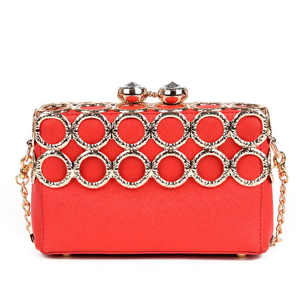 Geanta de dama eleganta in patru culori cu decor metalic cu maner metalic