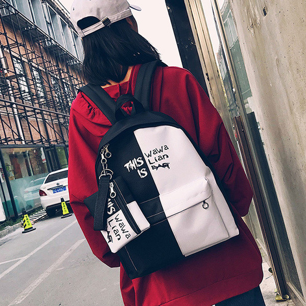 Alkalmi női hátizsák plusz egy pénztárca két színben feliratos