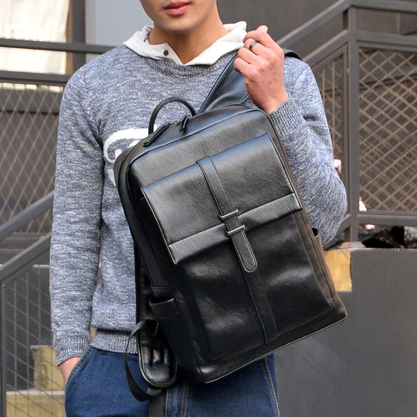 Мъжка практична раница от еко кожа с преден дълбок джоб - два модела в черен цвят