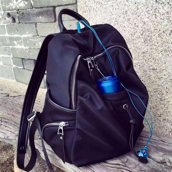 Rucsac de damă cu buzunare laterale de culoare neagră