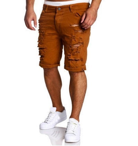 Nyári rövid farmernadrág alacsony derékkal, szakadt motívumokkal