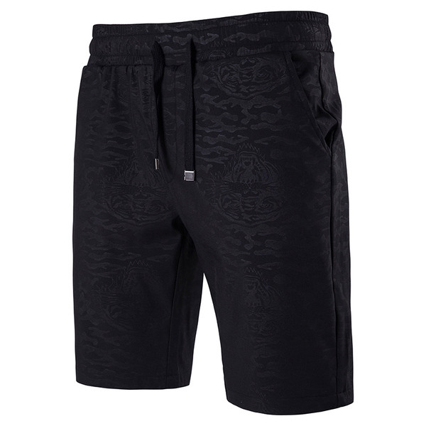 Férfi nyári nadrág fekete színben nyakkendővel és zsebbel