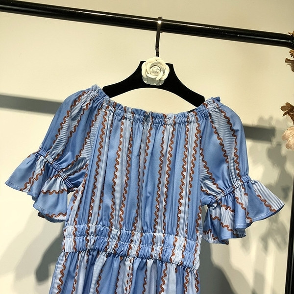 Modern nyári női hosszú jumpsuit rövid ujjú kék színben, mintával