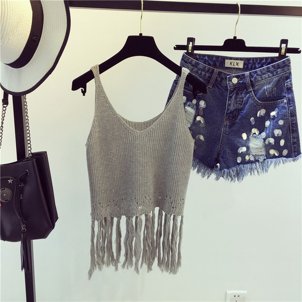 Stílusos női felső bojttal több színben