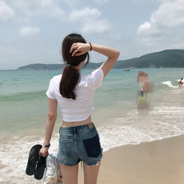 Stílusos női blúz rövid ujjal, O-alakú gallérral, keresztkötéssel - két szín