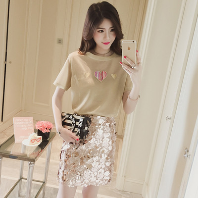 Fényes női póló szívvel