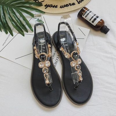 Stílusos női szandál díszítő kövekkel fekete és zöld színben