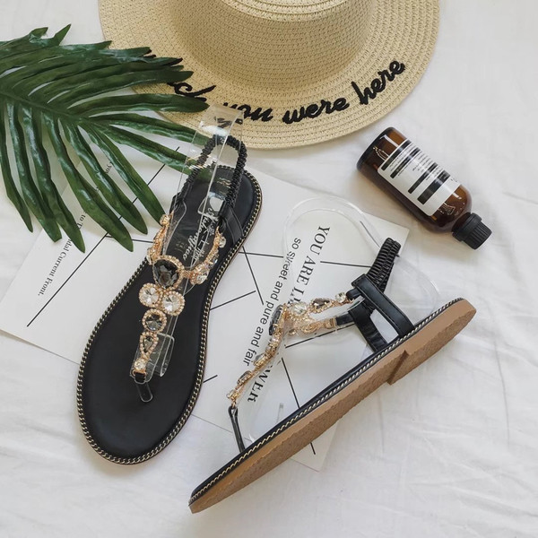 Stílusos női szandál díszítő kövekkel fekete és zöld színben