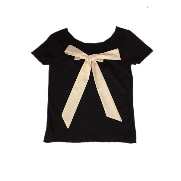 Női póló nyitott háttal és szalagos elemmel