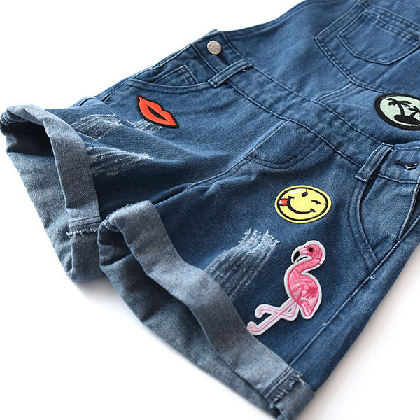 Két színben állítható pánttal ellátott gyerekoverall lányoknak hímzéssel