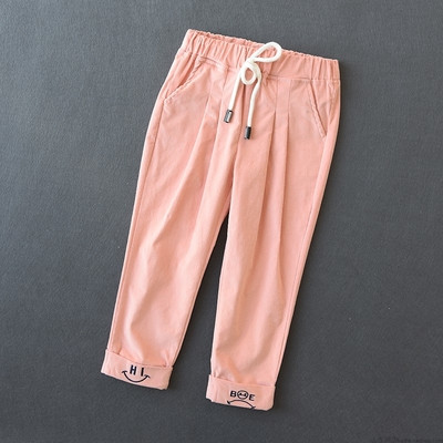 Elasztikus derékkal és több színben hímzéssel ellátott gyereknadrág lányoknak és fiúknak egyaránt