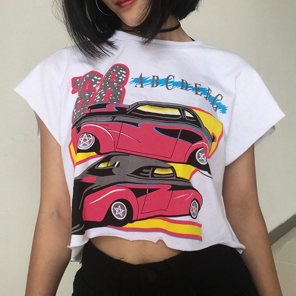 Alkalmi női nyári póló fehér színben, rátéttel