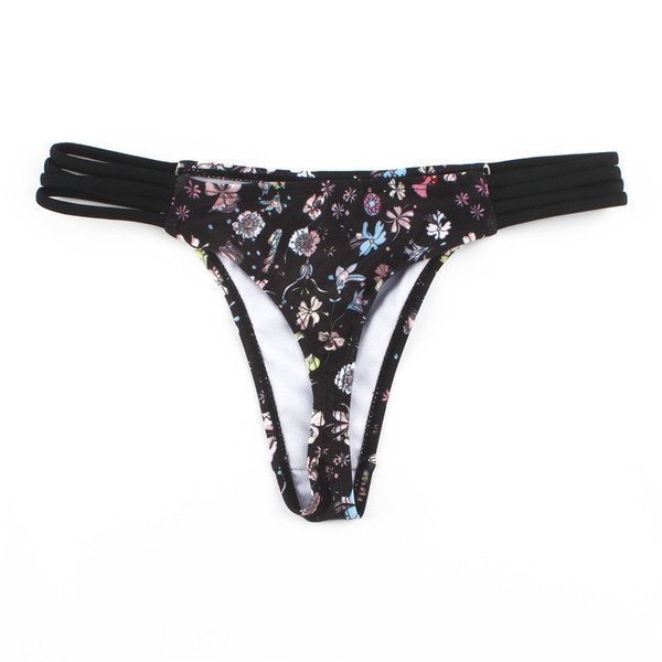 Fekete színű, kétrészes női fürdőruha virágos motívumokkal és nyakkendőkkel