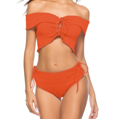 Kétrészes női fürdőruha magas derékú bikinivel és rövid ujjú felsővel