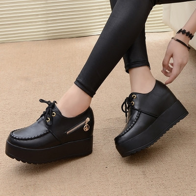 Modern women`s leather shoes in different models and zipper decoration