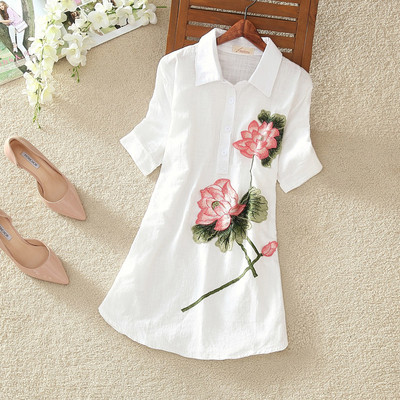 Women`s stylish long shirt with colorful embroidery