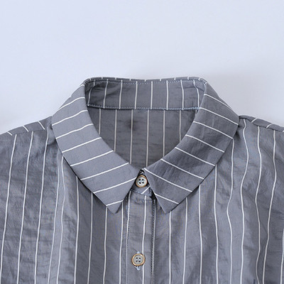 Elegáns női ujjatlan ing fehér és csíkos színben