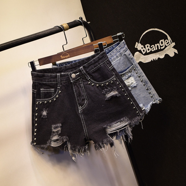 Fém kockákkal díszített női farmer rövidnadrág két színben