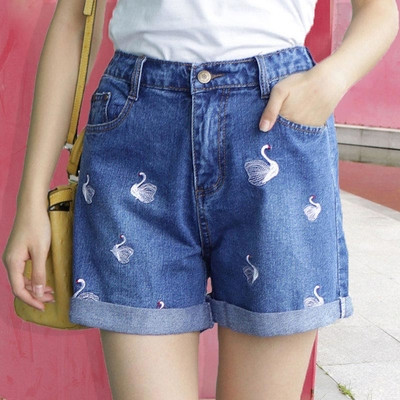 Women`s denim shorts with embroidery in several different variants