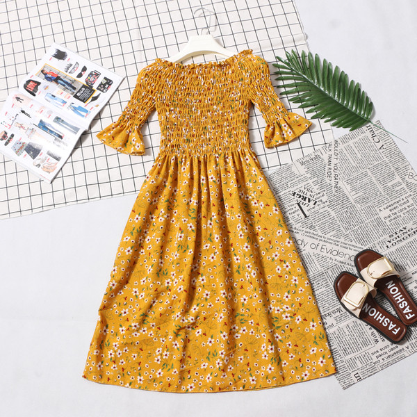 Κομψό γυναικείο  φόρεμα με 3/4 μανίκι με floral μοτίβο