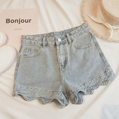 Női farmer rövidnadrág fürtökkel