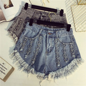 Fém körökkel díszített női farmer rojtos farmernadrág két színben