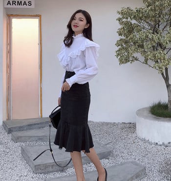 Stílusos női szoknya magas derékkal, fekete szabással