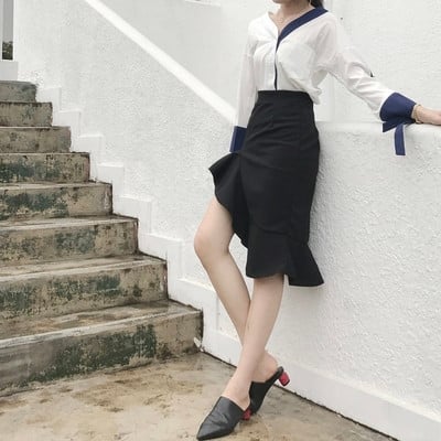 Aszimmetrikus hosszúságú női szoknya fekete színben