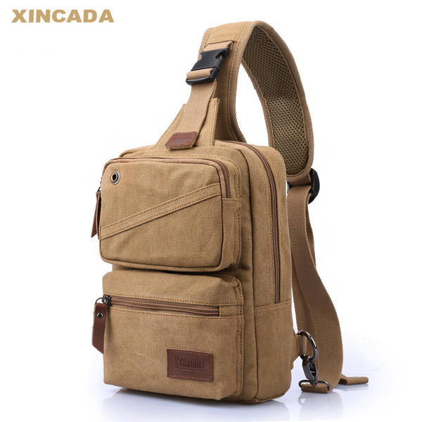 Hétköznapi kis férfi hátizsák anyagból, hosszú fogantyúval, több színben zsebekkel