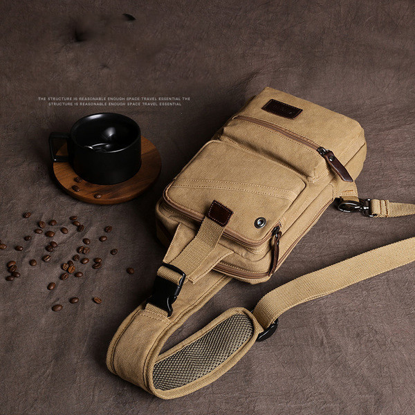 Hétköznapi kis férfi hátizsák anyagból, hosszú fogantyúval, több színben zsebekkel