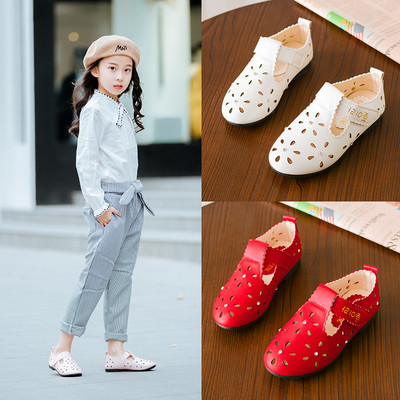 Children`s shoes for girls in white, pink and red