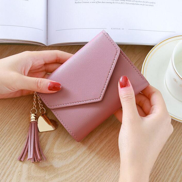 Portofel de dama cu ciucuri si inima metalica in mai multe culori