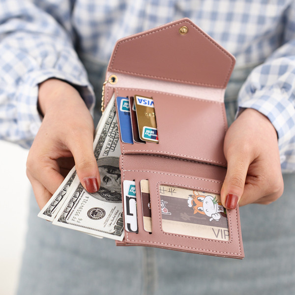 Portofel de dama cu ciucuri si inima metalica in mai multe culori