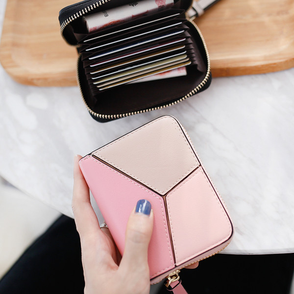 O poseta mica de dama din imitatie de piele cu fermoar in trei culori