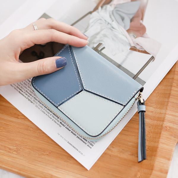 O poseta mica de dama din imitatie de piele cu fermoar in trei culori