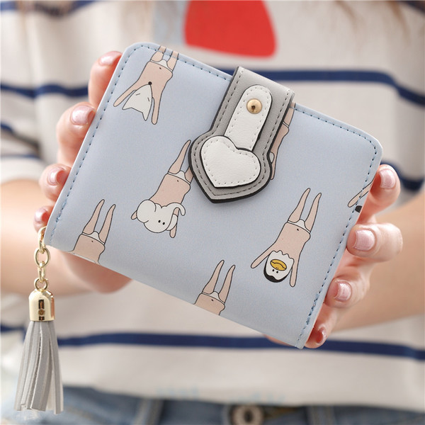 Portofel de dama cu aplicatii interesante cu ciucuri in mai multe culori