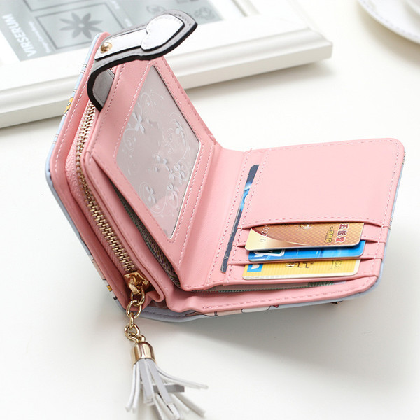 Portofel de dama cu aplicatii interesante cu ciucuri in mai multe culori