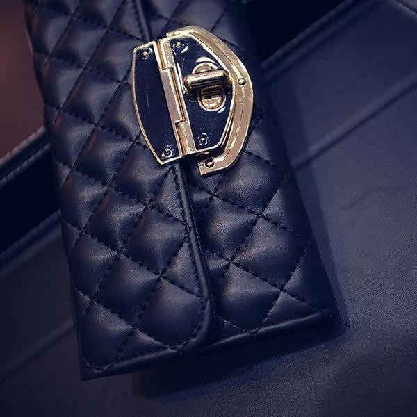 Portofel elegant de damă, auriu și negru