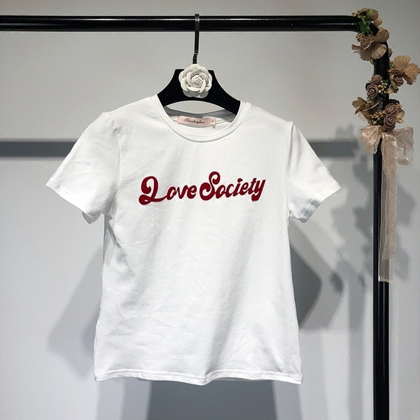 Tricou de damă sport-casual în alb și negru cu inscripție