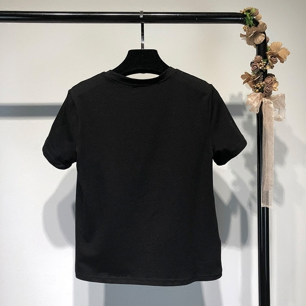 Tricou de damă sport-casual în alb și negru cu inscripție