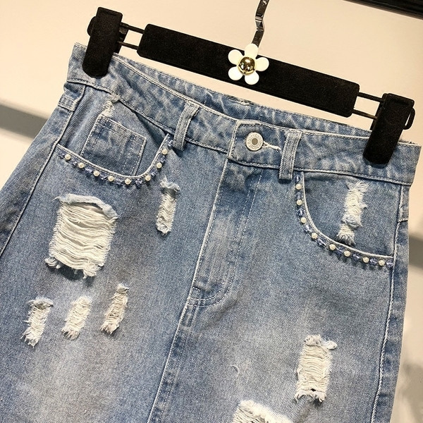 Fusta de dama din denim moderna cu motive rupte si talie inalta