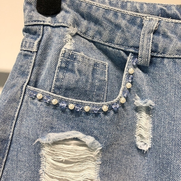 Fusta de dama din denim moderna cu motive rupte si talie inalta