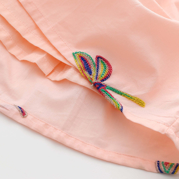 Rochie pentru copii in culori vii cu imprimeu si nasturi decorativi