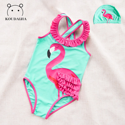 Modern children`s swimsuit for girls with flamingo applique