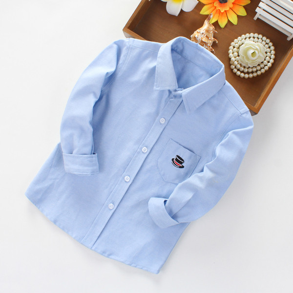 Παιδικό πουκάμισο για αγόρια σε διάφορα χρώματα με διακοσμητική τσέπη και κεντήματα