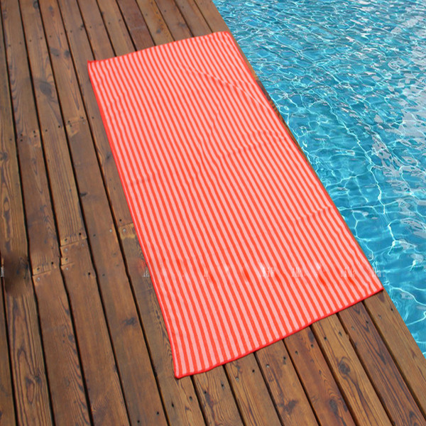 Πετσέτες παραλίας σε διάφορα χρώματα
