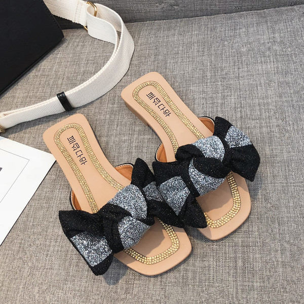 Papuci eleganti de damă, în albastru și negru, cu o panglică strălucitoare