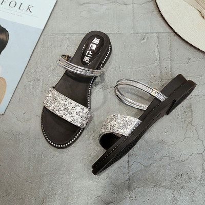 Γυναικεία περιστασιακά σανδάλια με επίπεδη σόλα και  διακοσμημένες πέτρες